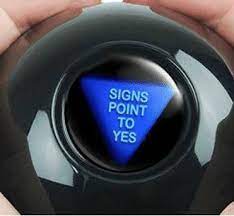 a magic 8-ball toy with the result saying signs point to yes