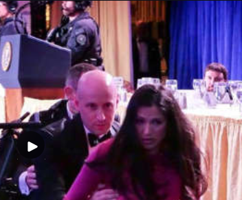 Here you can see Trump hiding behind a curtain, reveling in his kayfabe.