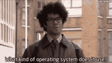 IT Crowd sitcom scene where Moss and Roy are standing in front of bomb removal robot and Moss asks what operating system gif