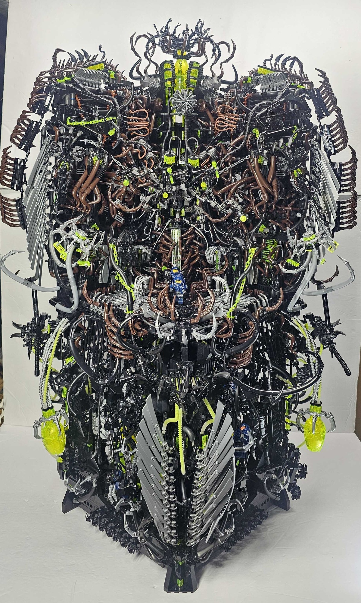 This is a biomechanical forge that is a living creature, harvesting victims in search of transcendence.